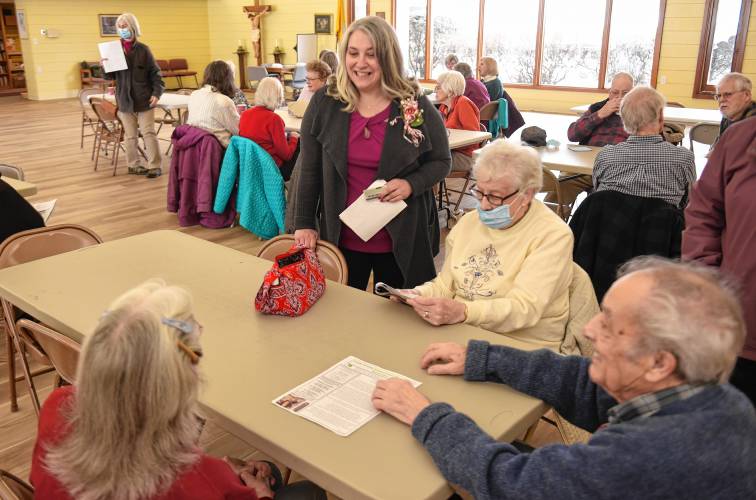 Jennifer Remillard, the new Director of the South County Senior Center, chats with members at a meet and greet on Wednesday at the center's temporary location at the Holy Family Roman Catholic Church's Pope St. John Paul II Center.